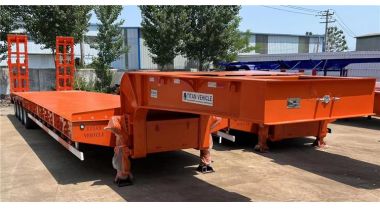 4 Axle 100 Ton Low Bed Truck Trailer has been sent to Angola